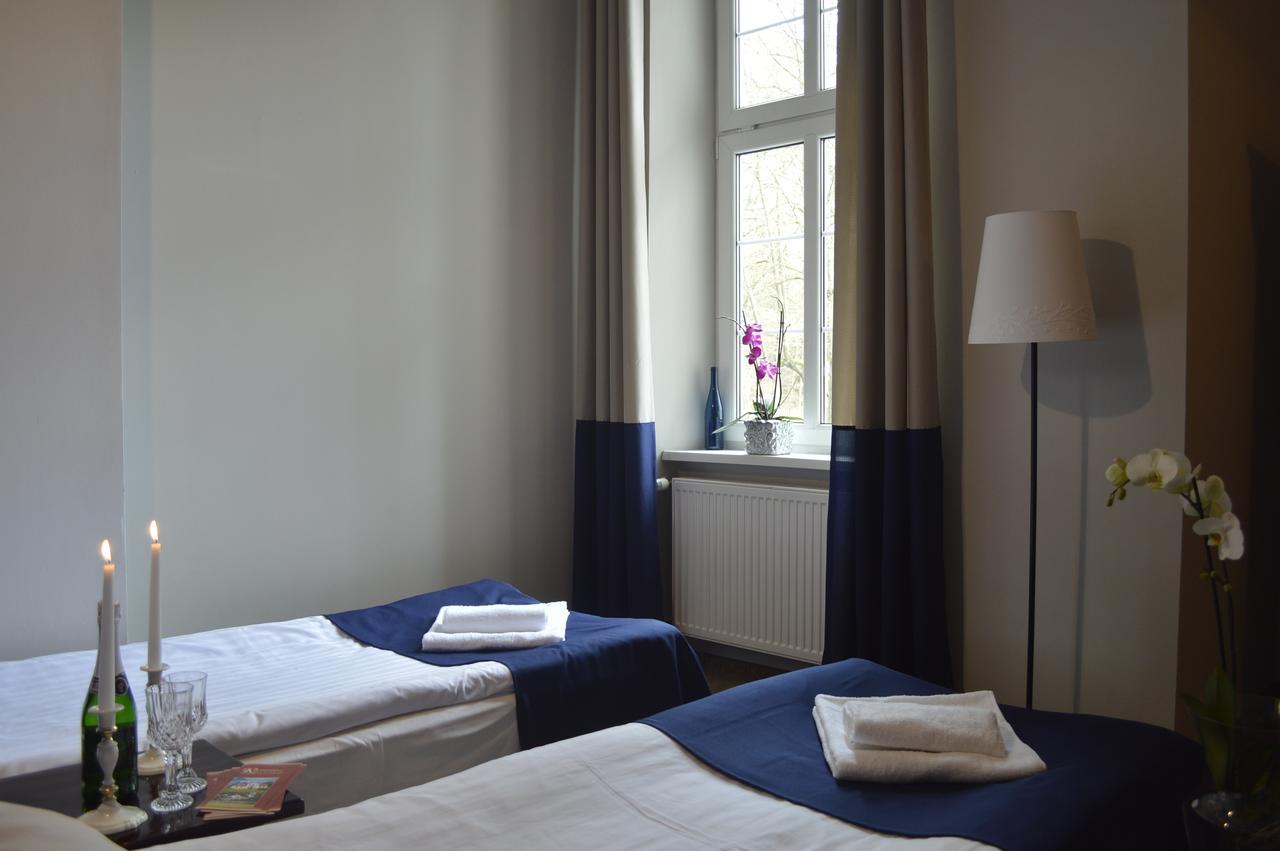 Hotel Ksiezycowy Dworek Kętrzyn Rum bild